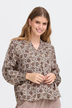 Load image into Gallery viewer, Woman wearing a patterned blouse against a white background