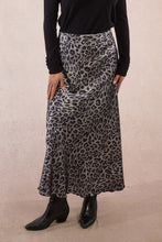 Load image into Gallery viewer, Person wearing a leopard print skirt with a plain background
